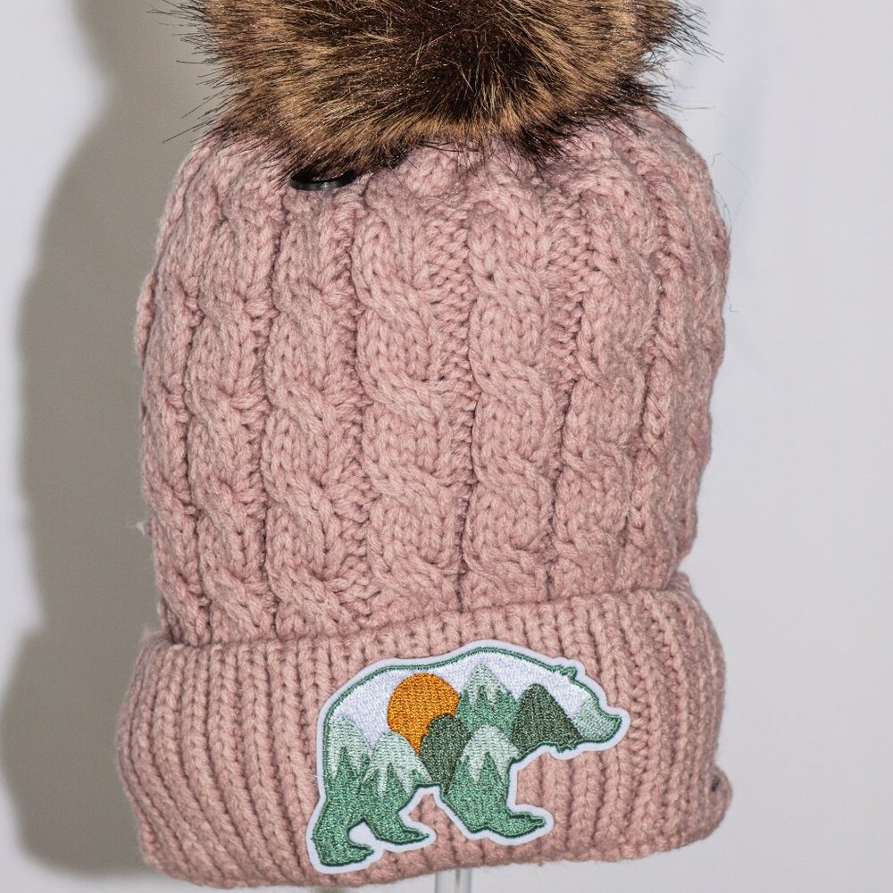 Pink stocking cap with "Mountain Bear" patch and fuzzy lining